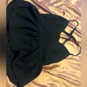 Black tank top, low cut, flowy material, adjustable straps